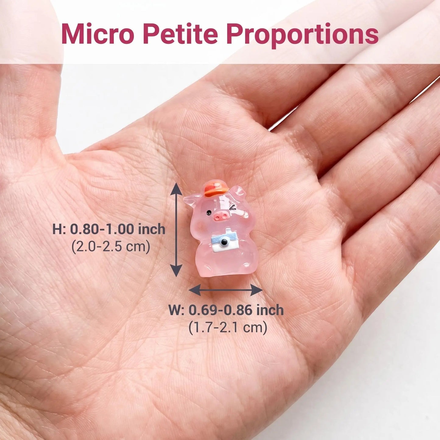 Mini pink pig dimensions shown in a hand