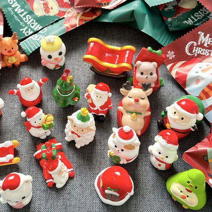 Assorted Christmas miniature figures with Santa, snowmen, reindeer and blind bags