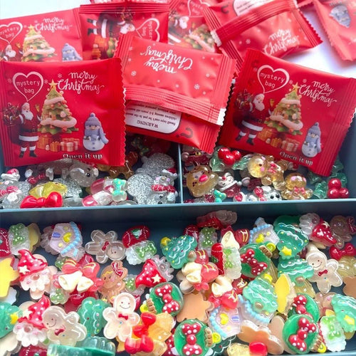 Red Christmas mystery bags with assorted translucent holiday mini ornaments
