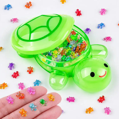 Green jumbo turtle container filled with colorful mini turtle figures