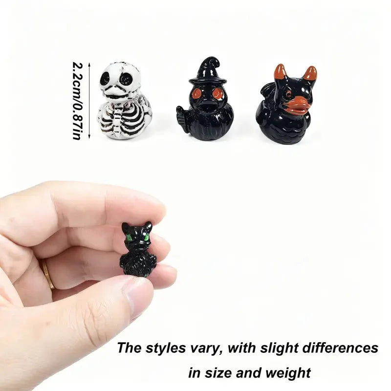 Small Halloween resin duck figurines shown at approximately 2.2 cm tall